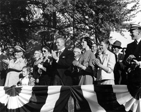 1957 photo of Governor LeRoy Collins enjoying inauguration parade with his family and General Lance