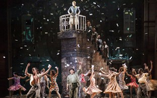 Photograph of people dancing onstage at Asolo Repertory Theatre